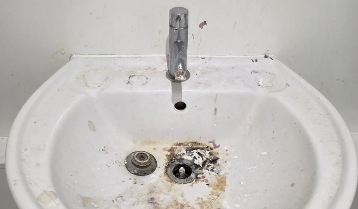 Before specialist biohazard cleaning in a Sunbury-on-Thames in property showing heavy surface contamination and staining.